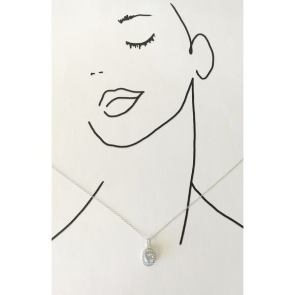 Diamond halo around Sky Blue Topaz pendant necklace - Picture 8 of 9